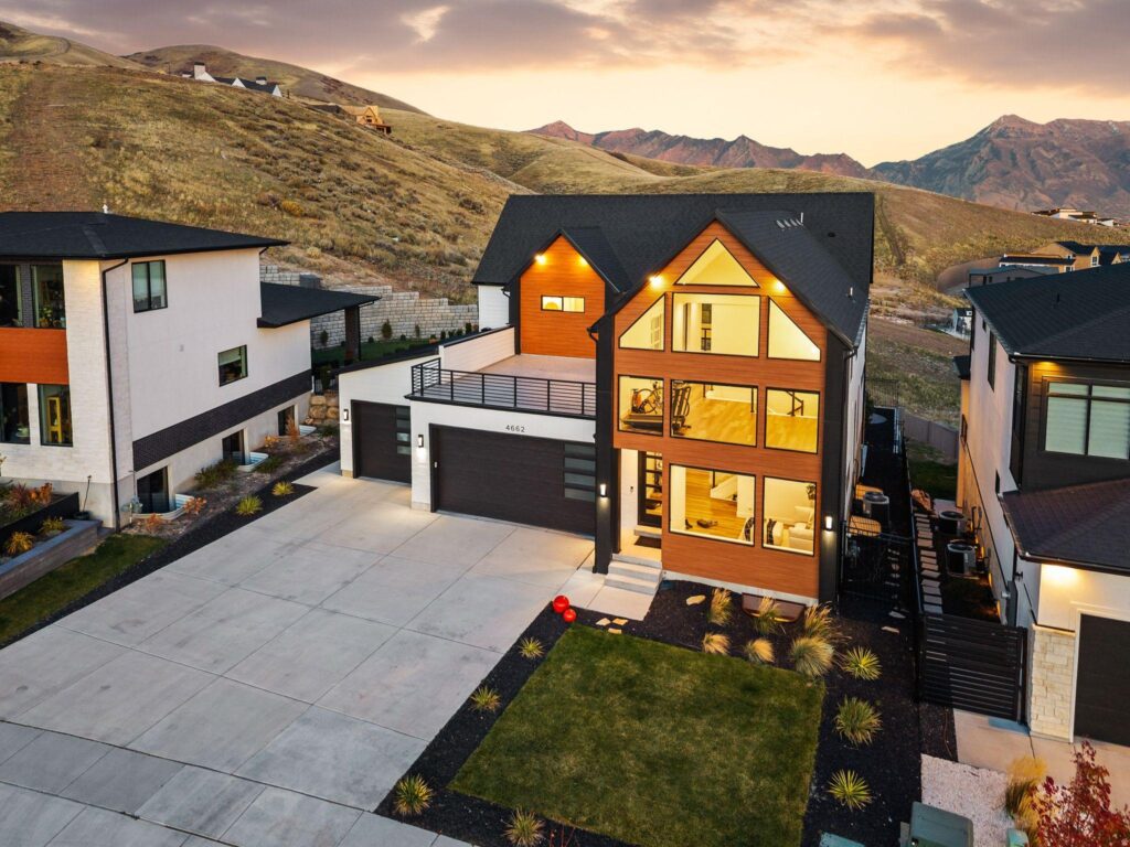 Homes in Utah with the Wasatch Mountains behind them, representing Utah mortgage solutions from Quinn Richins and VanDyk Mortgage